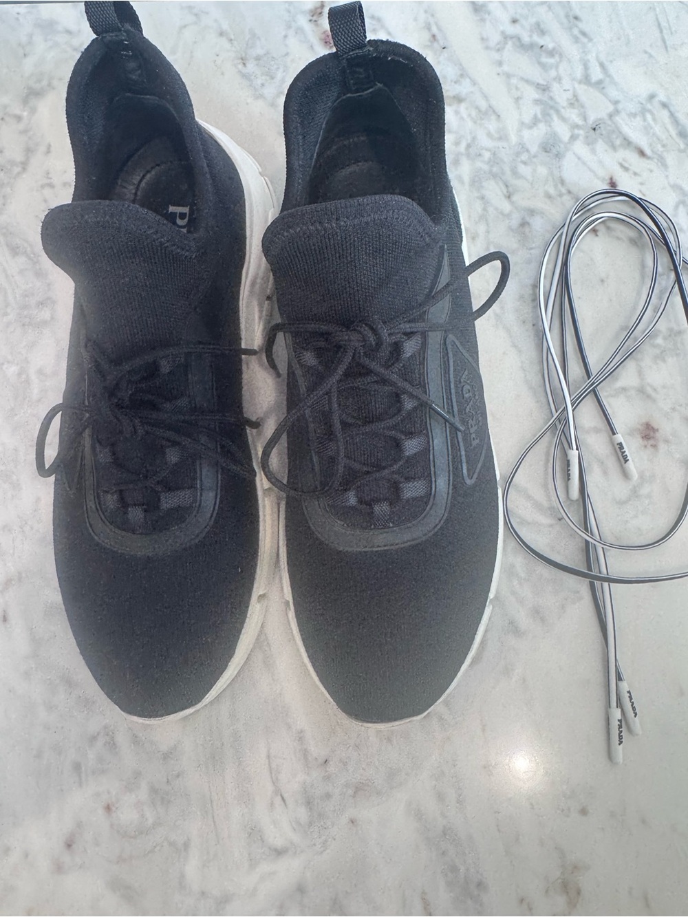 Prada Woman’s Slip ons. Black Knit Athletic Sneakers. Extra laces.